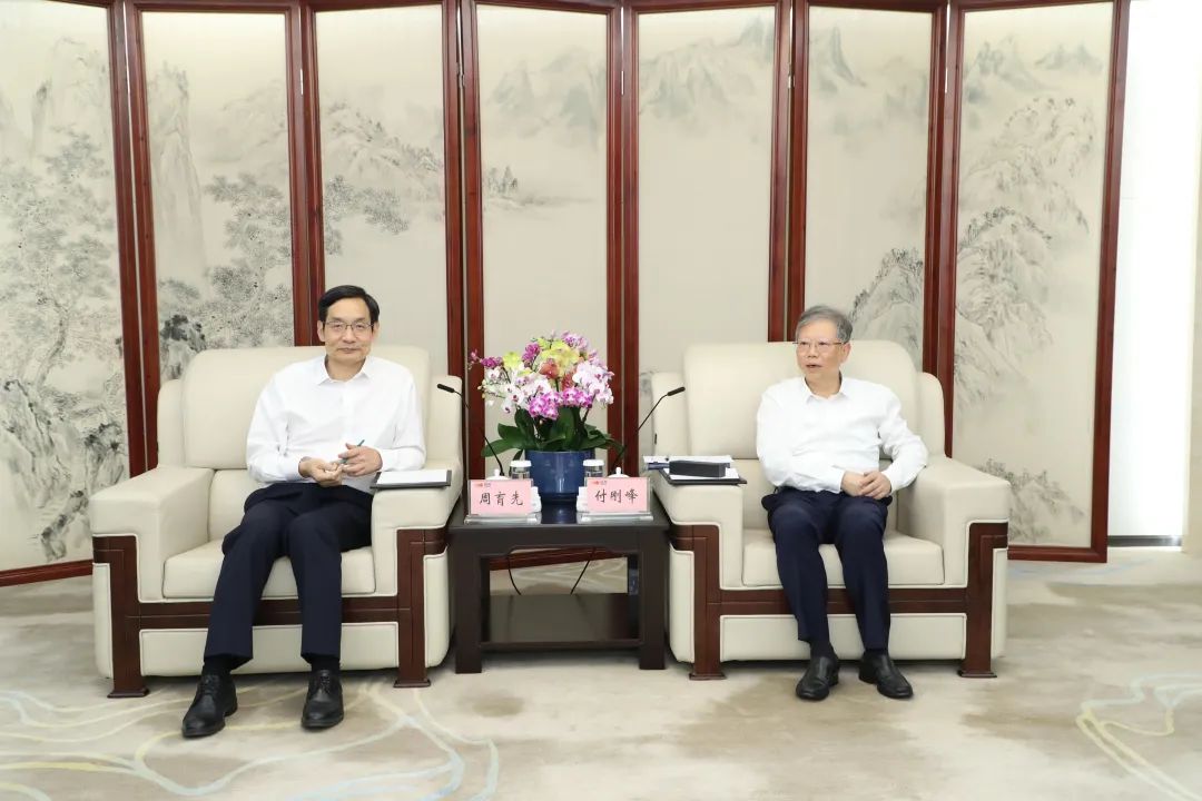 		周育先造访国家开发投资集团_责任动态_尊龙凯时集团有限公司	